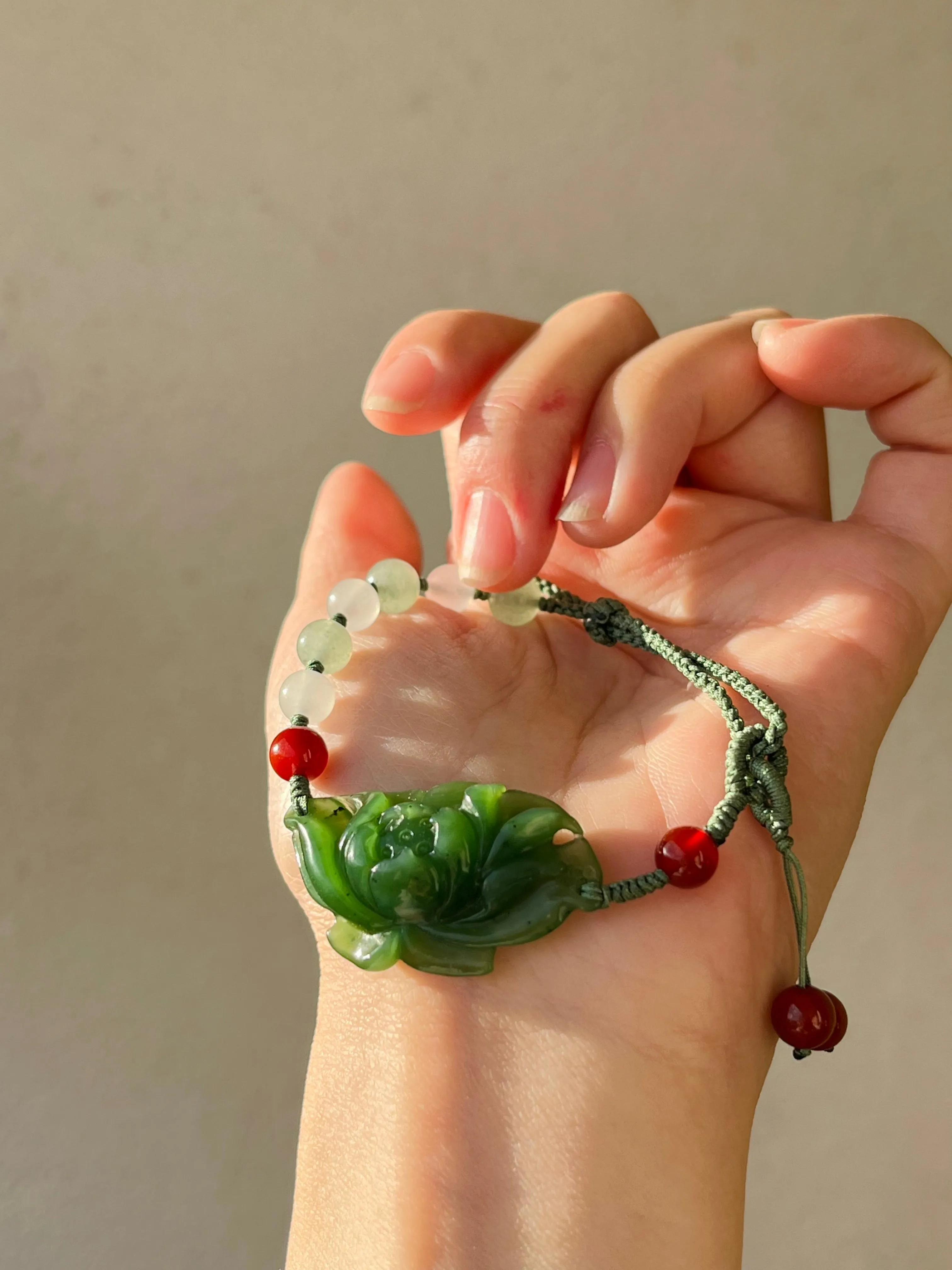 Handwoven Bracelet with a Handcarved Green Jade Lotus Flower, 手编和田碧玉莲花手牌